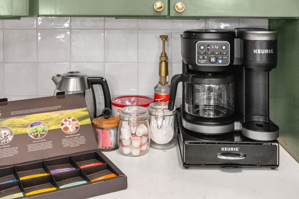 Keurig coffee, drip coffee, electric tea kettle and tea variety.