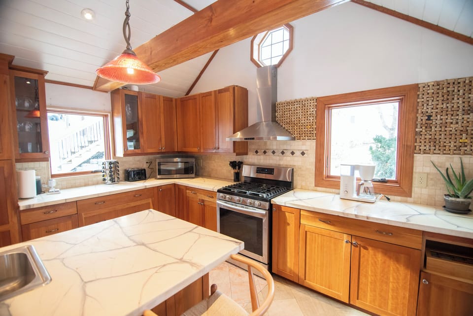 Spacious kitchen with atttached sitting porch.  
