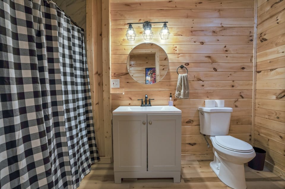 Full bathroom with walk-in shower located on the lower level 