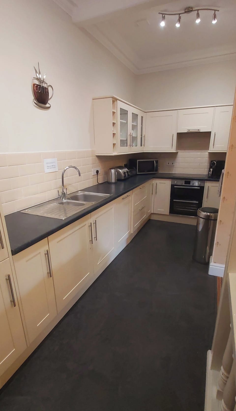 Kitchen with oven, hob, microwave, air fryer, fridge freezer, dishwasher