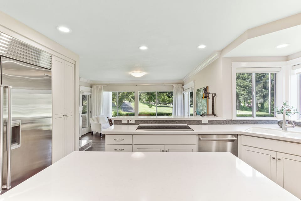 Cook a feast in a chef's kitchen as sunlight streams in