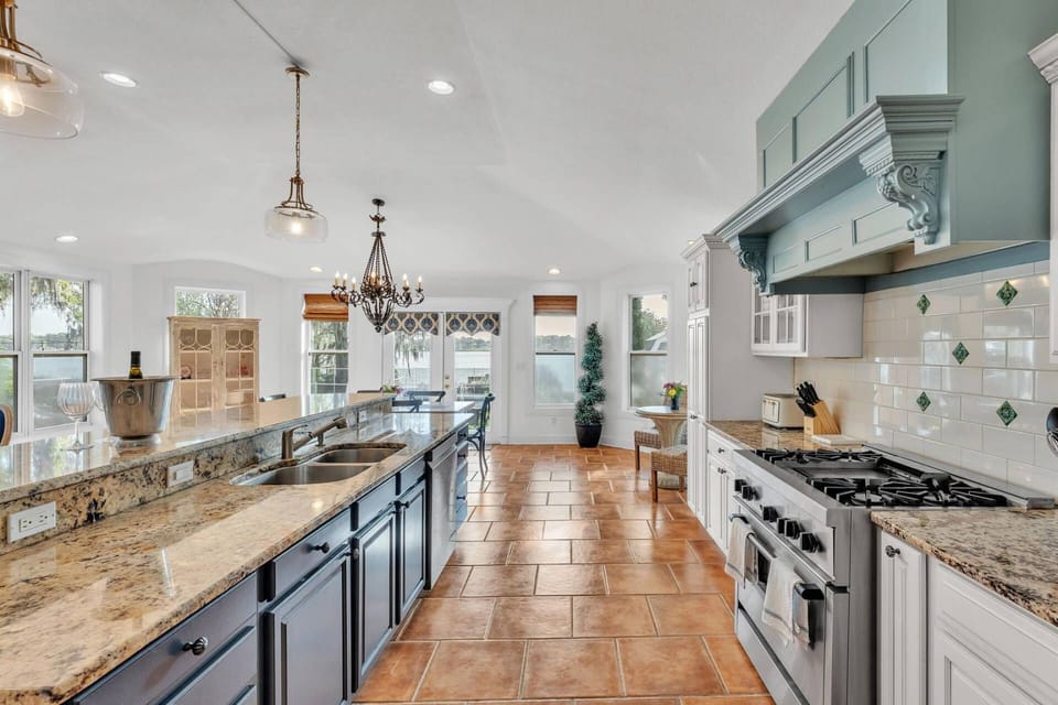 Explore the well-appointed gourmet kitchen with generous space and seating for all guests.