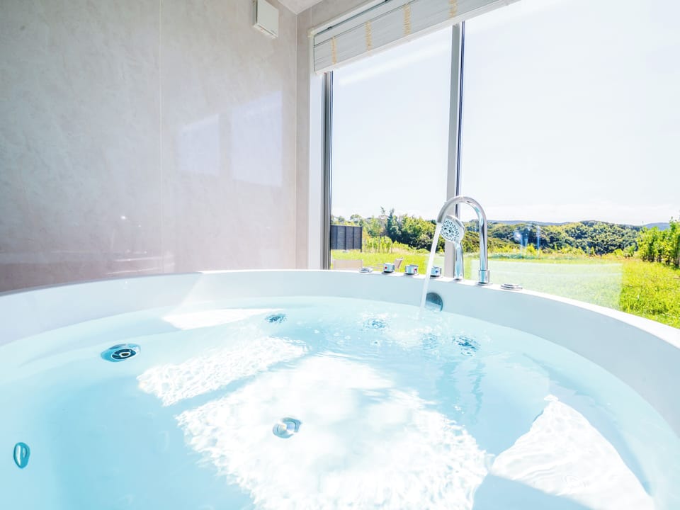 Quadruple Room, 4 Bedrooms, Non Smoking, Private Bathroom | Bathroom | Combined shower/tub, free toiletries, hair dryer, slippers