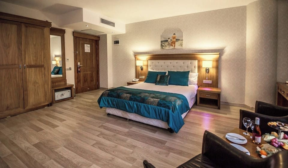 Quadruple Room | Bathroom | Shower, hair dryer, slippers, towels