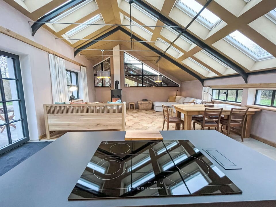 Wood, Interior Design, Flooring, Ceiling, Floor, Kitchen, Furniture, Lighting, Light Fixture, Wood Flooring