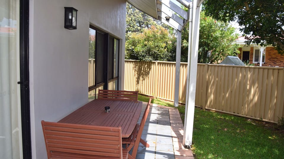 Back patio and outdoor dining.