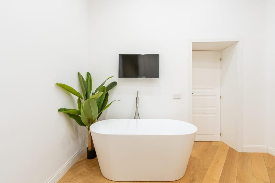 Luxury Apartment, City View | Bathroom | Separate tub and shower, hair dryer, bidet, towels