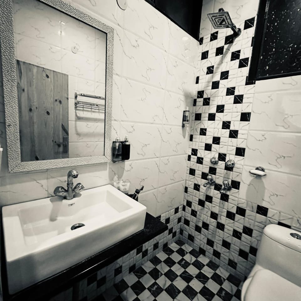 Deluxe Double Room, Balcony, City View | Bathroom | Shower, free toiletries, towels, soap