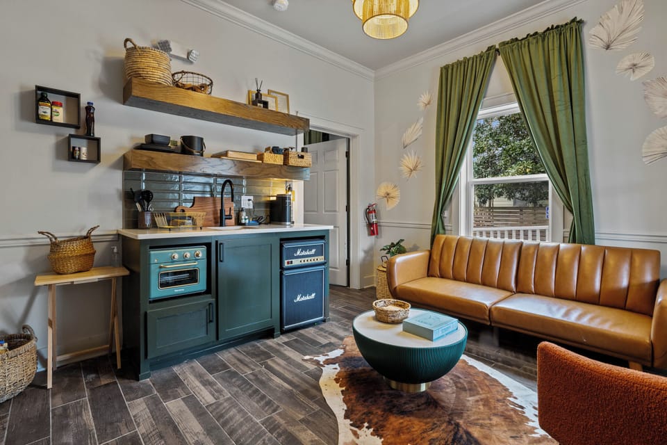 Our tiny kitchens are stocked with a fridge,toaster oven/airfyer,Keurig,plug in stovetop and blender