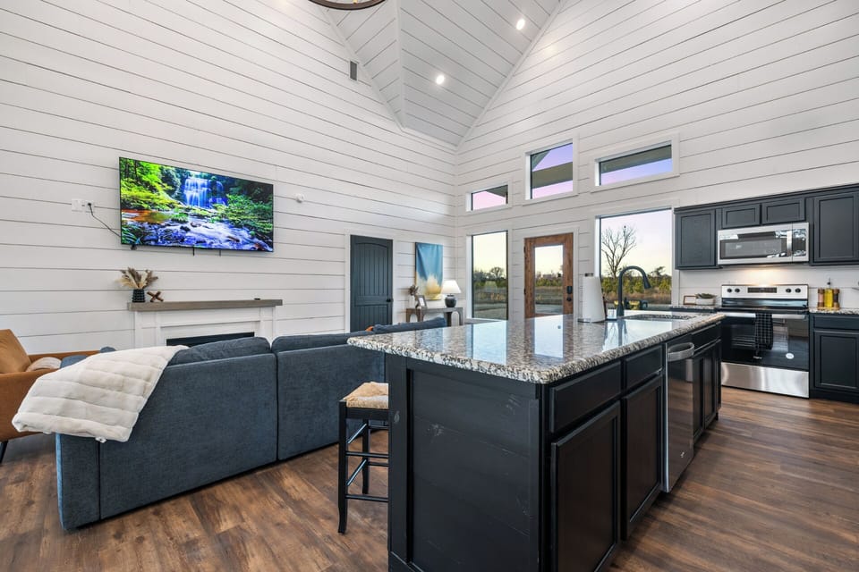 Across the living area is the kitchen