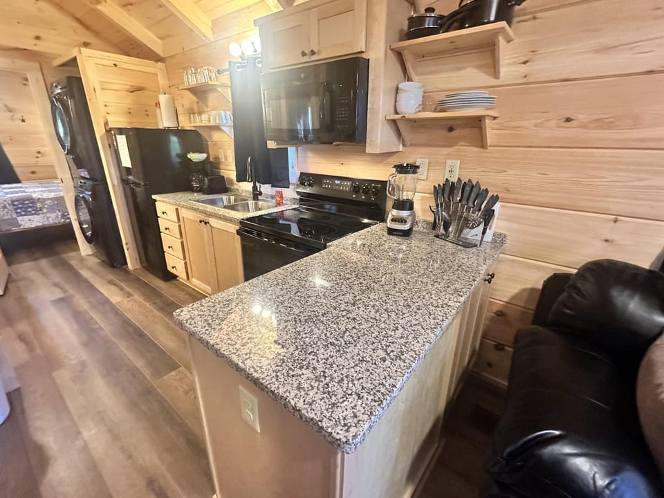 Cozy kitchen with granite island and modern appliances