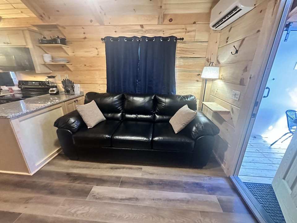 Cozy living area with sofa and natural wood charm