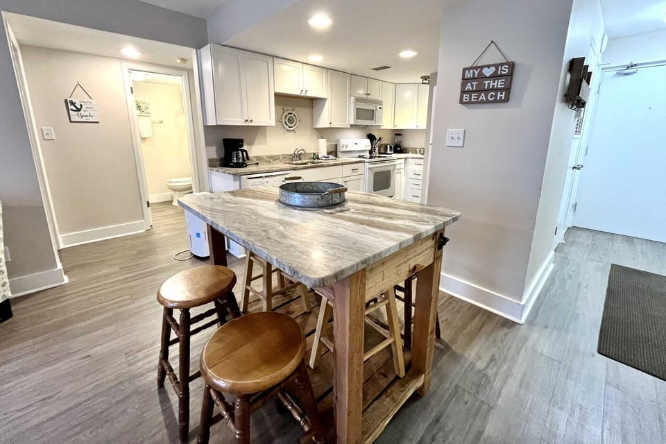 Nice dining table with granite counter.