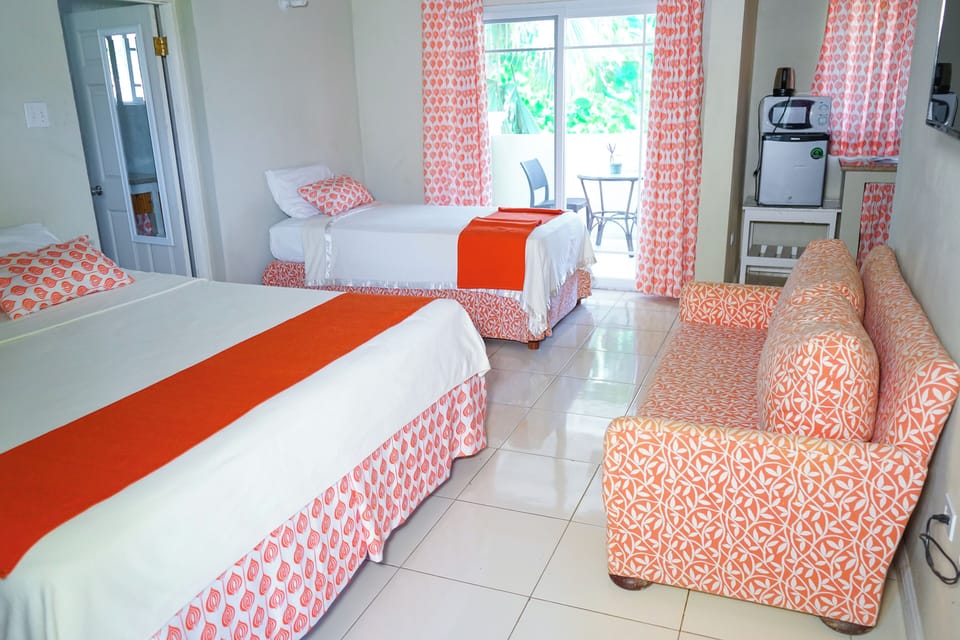 Deluxe Room, Balcony, Garden View | Down comforters, pillowtop beds, in-room safe, blackout drapes