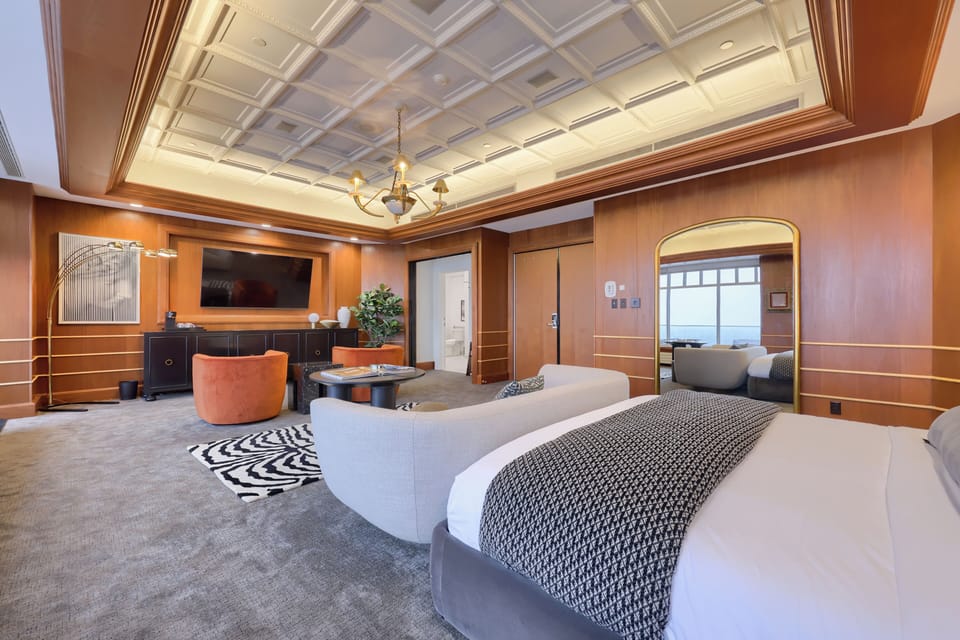 Luxury Studio Suite, 1 King Bed, Refrigerator, City View | Laptop workspace, iron/ironing board, free WiFi