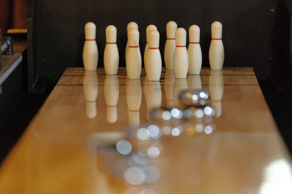 Ready to roll? Enjoy hours of fun with our bowling shuffleboard, a unique game that combines skill and strategy.