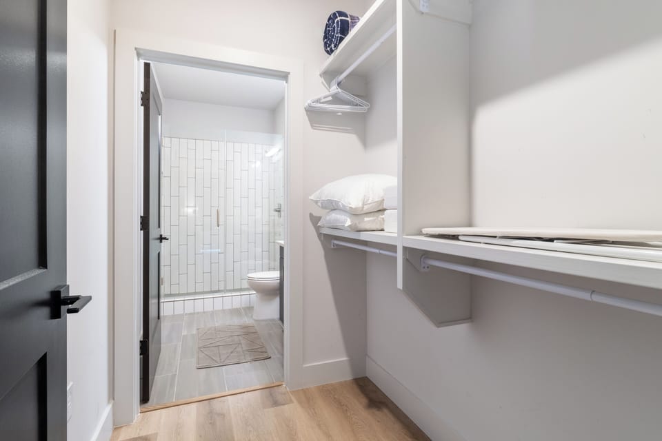 Bedroom 1's ensuite bathroom and closet.