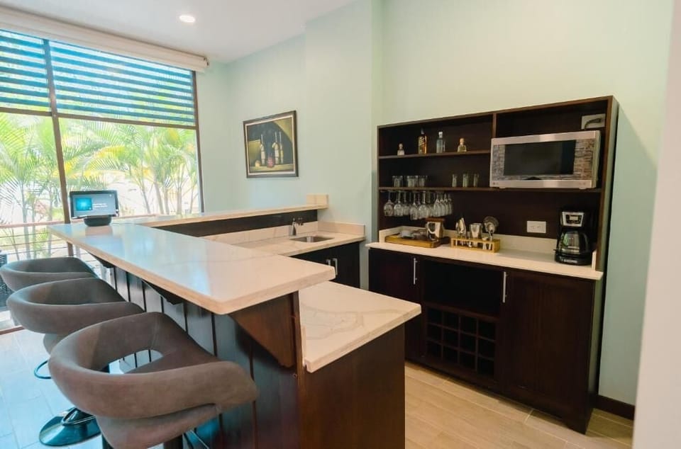 Deluxe Bungalow | Living area | 32-inch TV with cable channels, foosball, table tennis