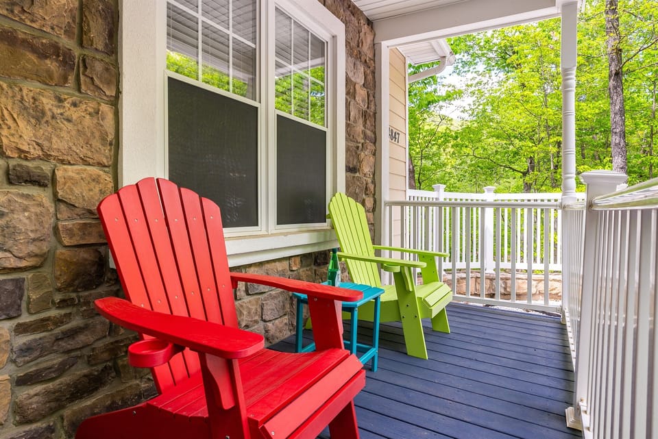 Sip your morning coffee or unwind at sunset in these cheerful porch chairs—surrounded by nature and the quiet calm of the mountains.