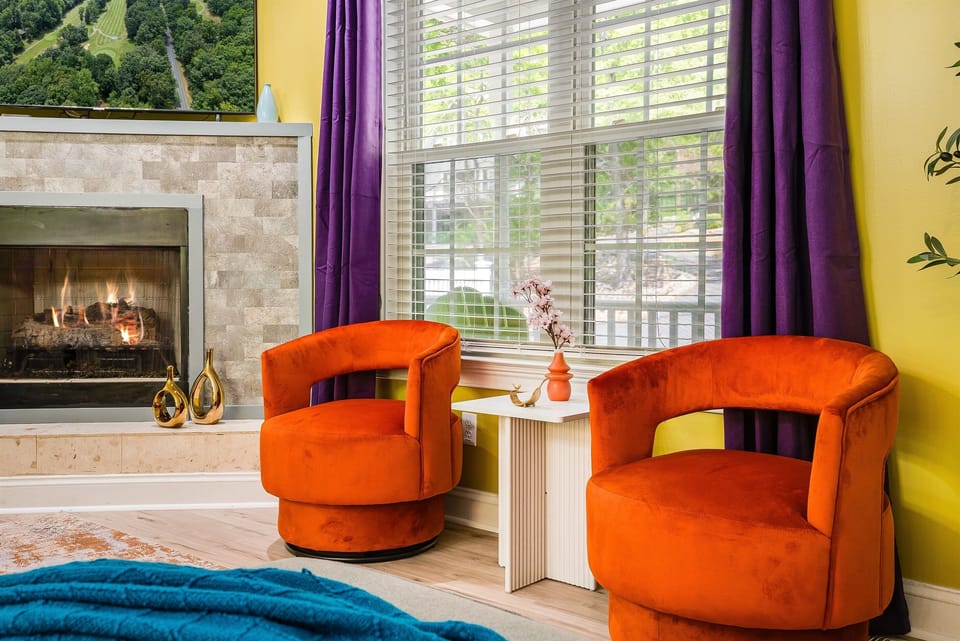Curl up in bold velvet chairs with a book or glass of wine by the fire.