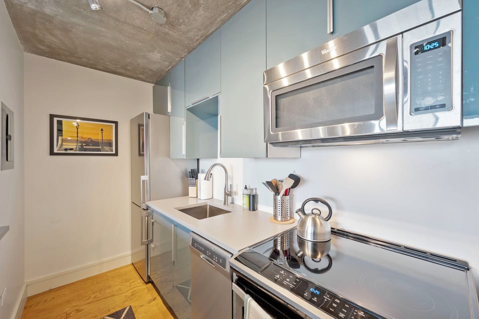 Newly remodeled kitchen with stove, oven, dishwasher, microwave, refrigerator