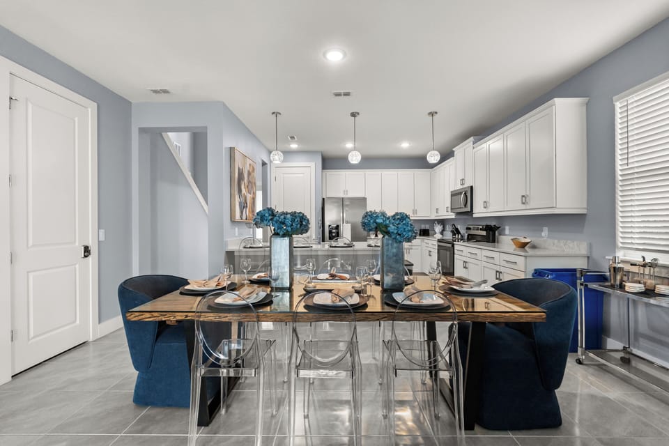Dine in style at the formal dining table, which comfortably seats 10 guests for any occasion