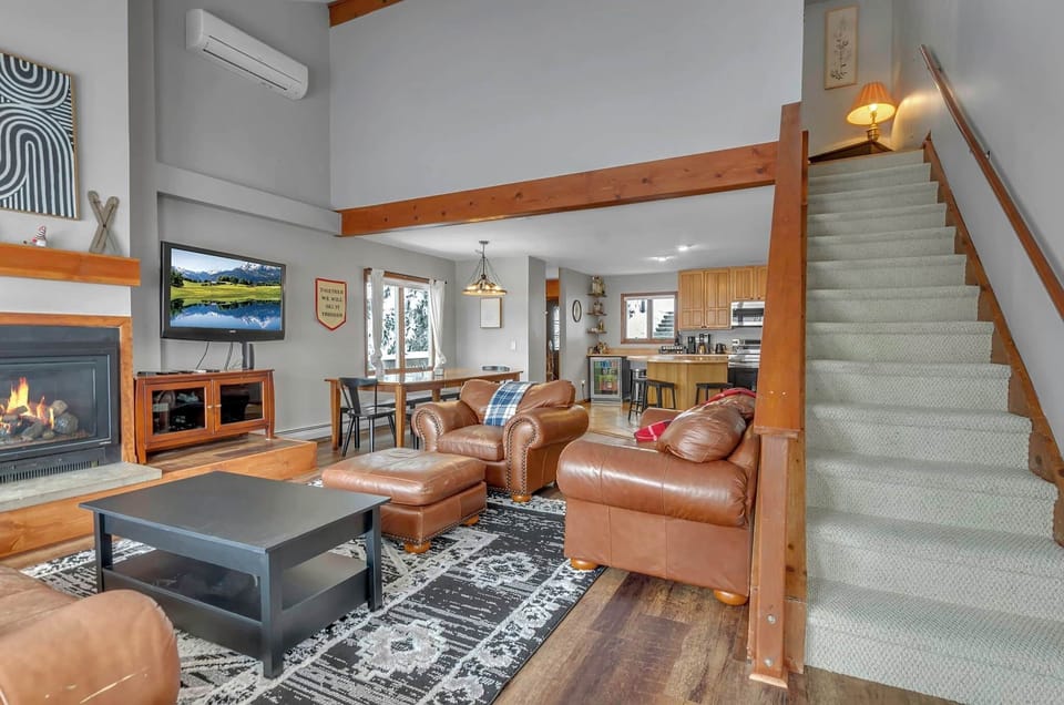 Spacious main living area with cozy seating and relaxing four-season retreat atmosphere