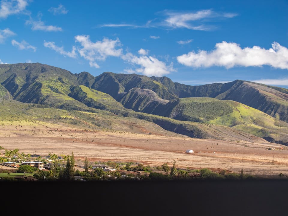 Marvel at the breathtaking views of the lush West Maui Mountains from your suite, perfect for a serene getaway.
