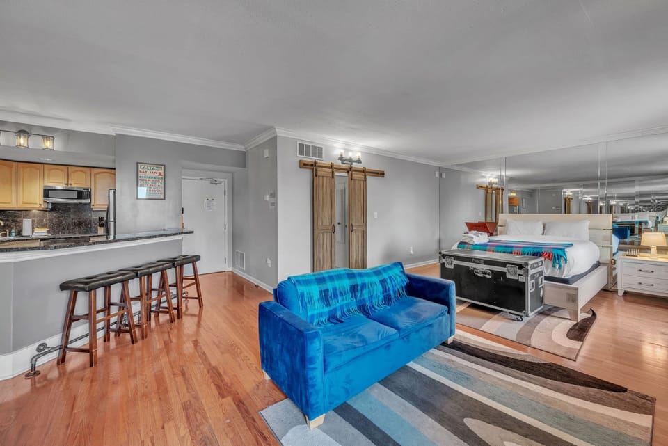 Signature Studio, 1 Queen Bed with Sofa bed, Pool Access | Living area | 50-inch Smart TV with digital channels, Netflix, streaming services