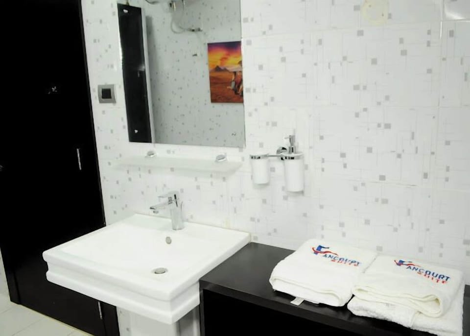 Economy Room, Balcony, City View | Bathroom | Free toiletries, hair dryer, towels, soap