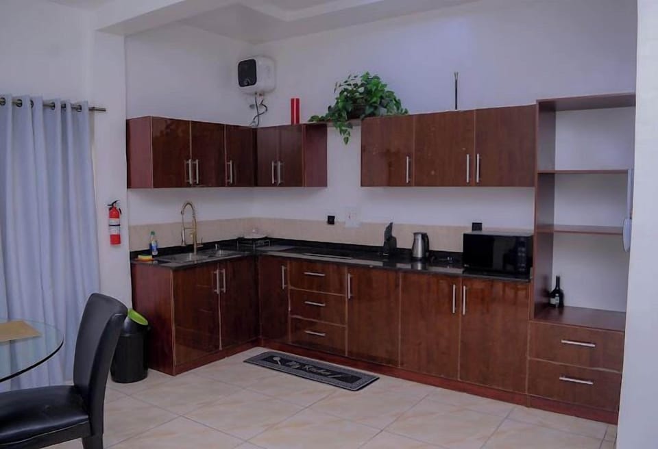Junior Apartment, Balcony, Beach View | Private kitchen | Fridge, microwave, oven, stovetop