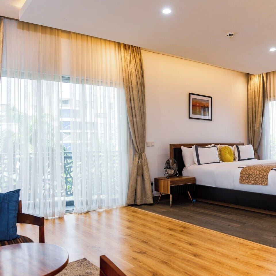 Deluxe Room, Balcony, City View | Desk, laptop workspace, free WiFi