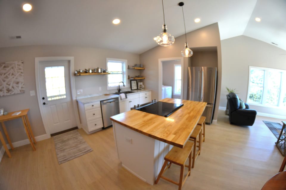 Vaulted ceilings and abundant light make the space feel open and inviting.