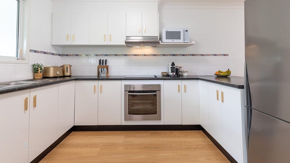 Full size Kitchen with appliances, cutlery, crockery, plates, etc.