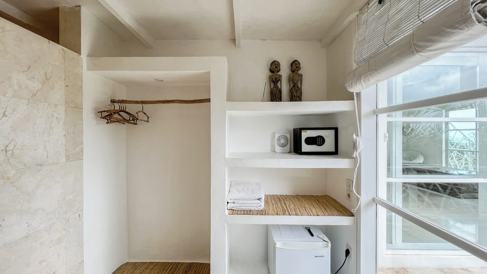 Kayu Suite | Bathroom | Hair dryer, bathrobes, towels, soap