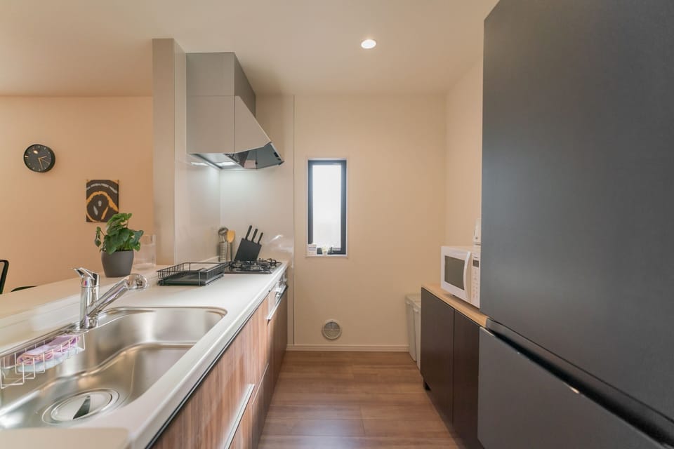 Luxury Villa | Private kitchen | Fridge, microwave, stovetop, dishwasher