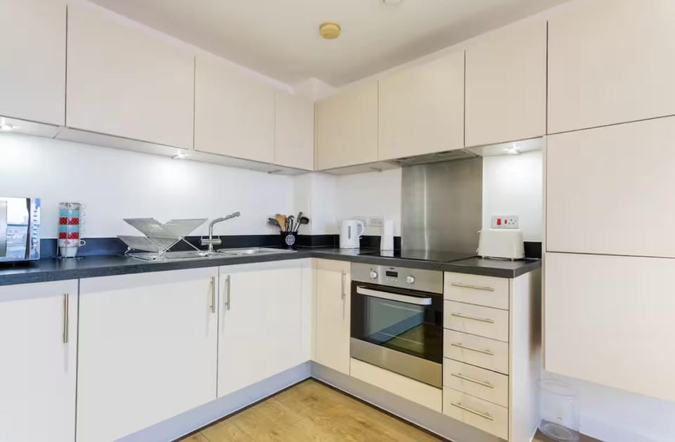 Apartment | Private kitchen | Fridge, microwave, oven, stovetop