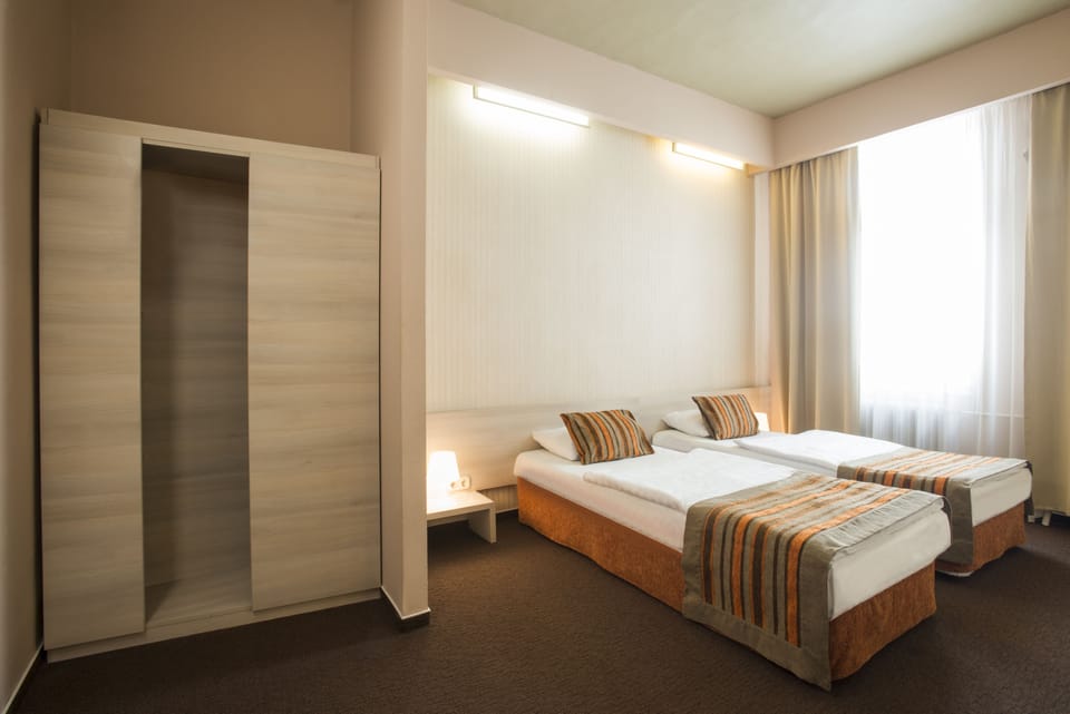 Double or Twin Room | In-room safe, iron/ironing board, free WiFi, bed sheets