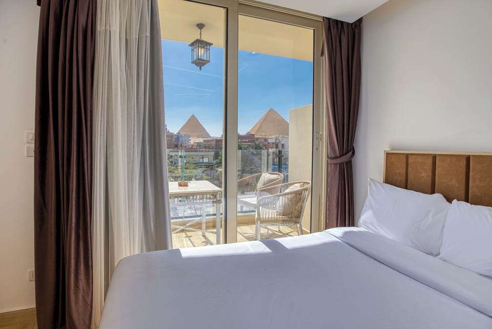 Junior Suite, Balcony, Mountain View | In-room safe, desk, laptop workspace, soundproofing