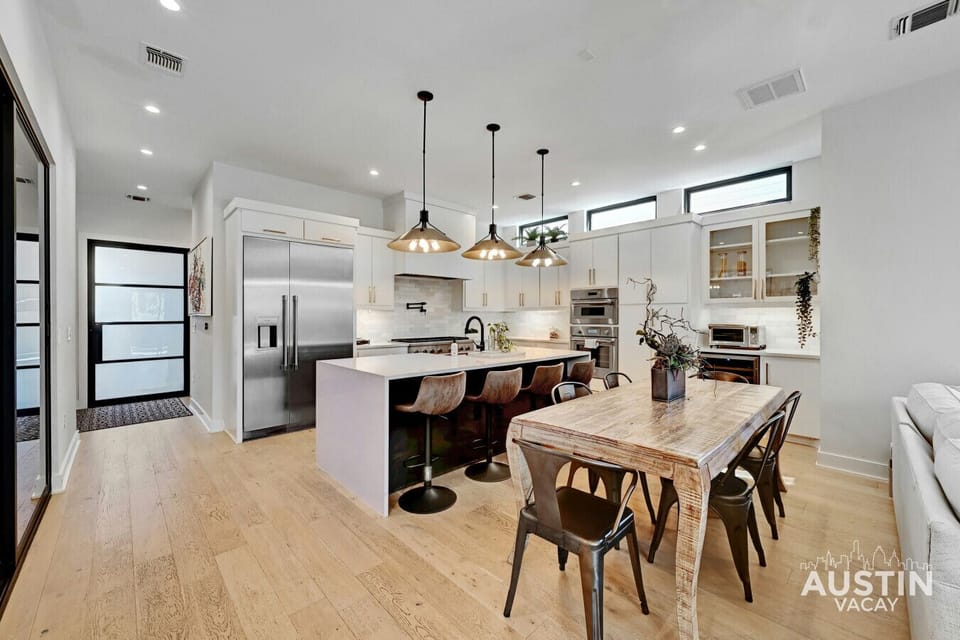 Rustic table meets modern kitchen vibes. Perfect for family meals, friendly banter, or late-night snacks after a day of Austin adventures.