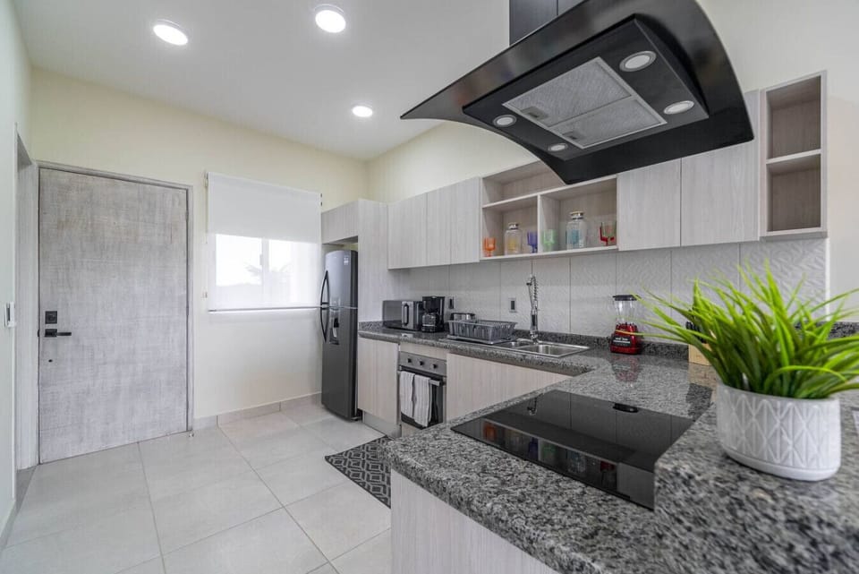 Cook up a feast or prepare a quick meal in this spacious, well-equipped kitchen designed for your convenience.