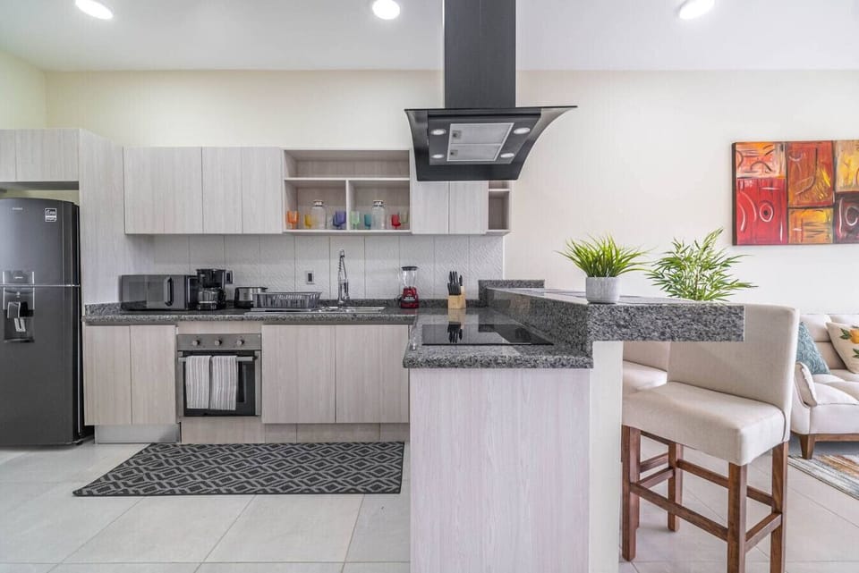 Cook up a feast or prepare a quick meal in this spacious, well-equipped kitchen designed for your convenience.
