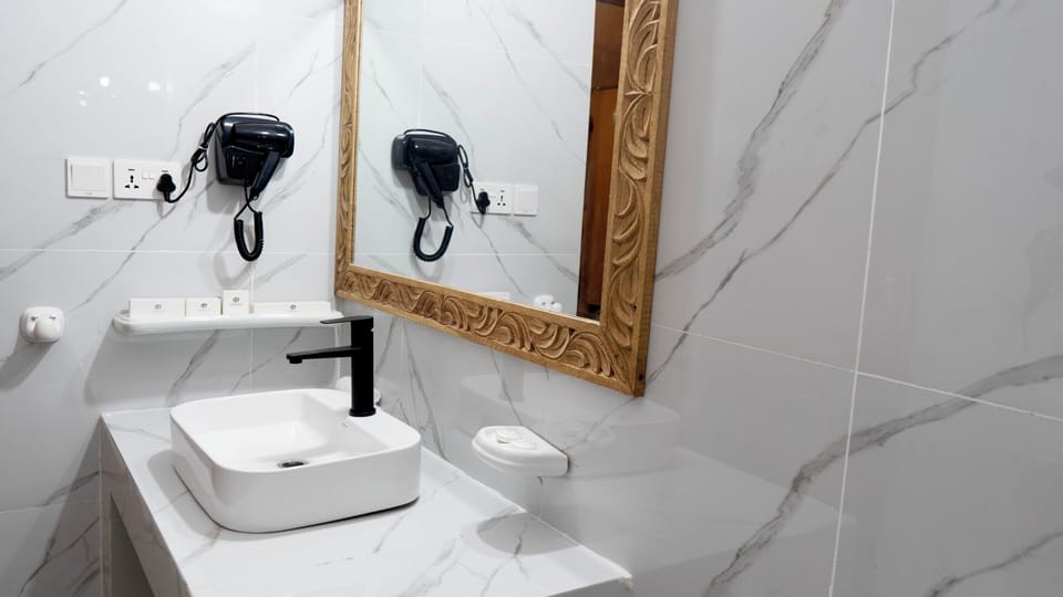 Hair dryer, slippers, towels, soap