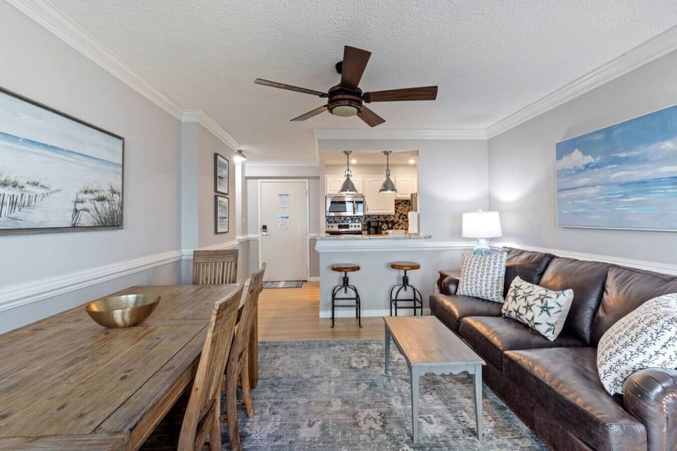 A charming dining space designed for comfort and convenience, perfect for breakfast, lunch, or dinner during your oceanfront getaway.