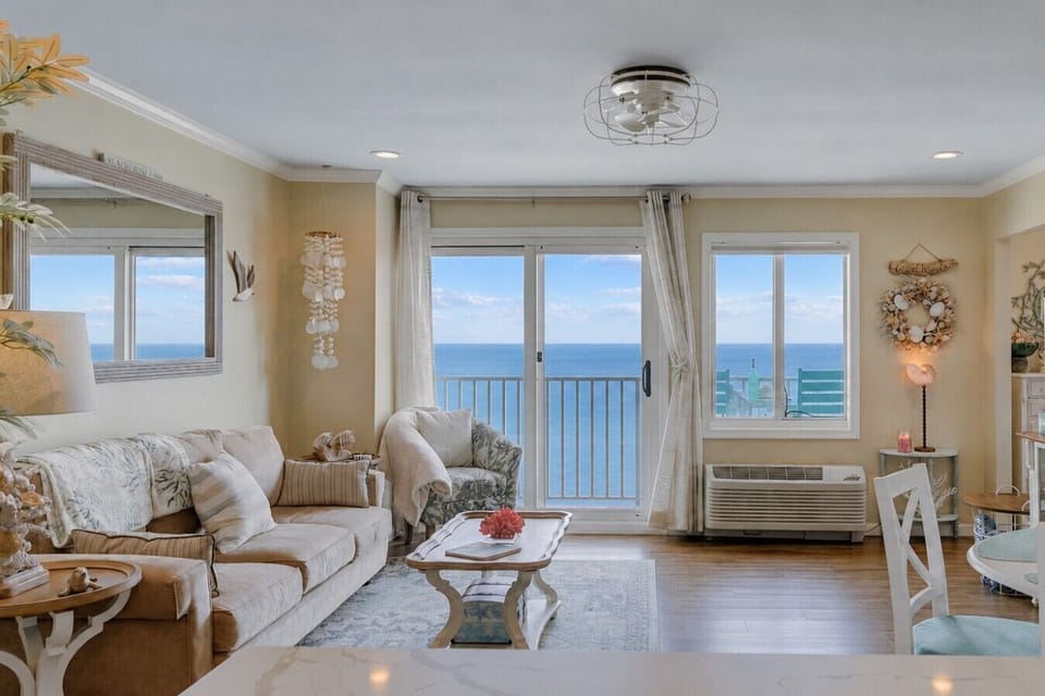 Open the balcony doors and enjoy panoramic ocean views, salty sea air, and the soothing sound of crashing waves.