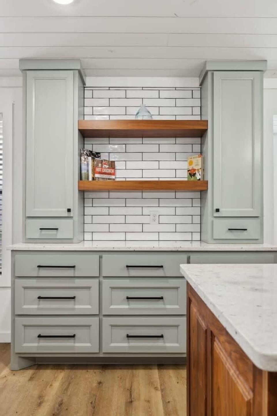 Fully equipped kitchen featuring stainless steel appliances and a kitchen island offering plenty of counter space.