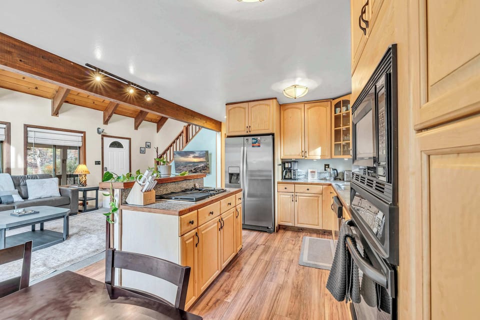 Kitchen: Drip coffee maker, Crockpot, air fryer, cooking utensils, tableware