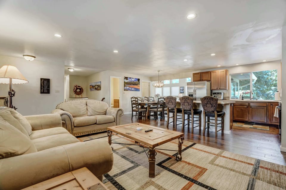 Spacious and inviting, the open living area seamlessly connects to the dining space and kitchen—perfect for gathering with family and friends!