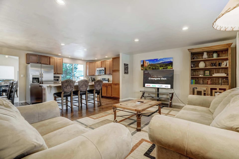 Spacious and inviting, the open living area seamlessly connects to the dining space and kitchen—perfect for gathering with family and friends!