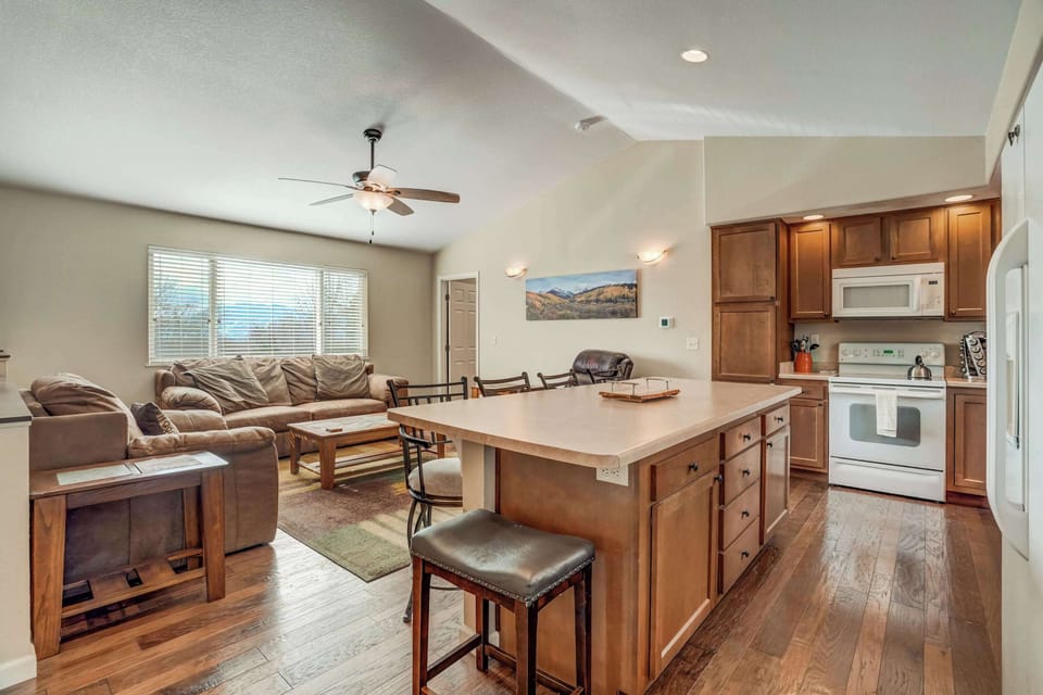 Open-concept living! A spacious kitchen and living area with plenty of seating, perfect for gathering and entertaining.





